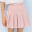 Pleated skirt with bow tie