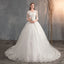 Robe de mariée, traîne, décolleté en V profond, dentelle