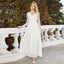 Robe de mariée slim blanche en dentelle avec col en V à la mode