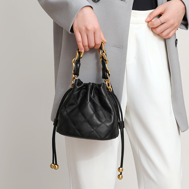 Sac à bandoulière en cuir pour femmes, mini et portable, de forme seau et au style à la mode
