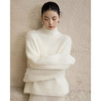 Pull col roulé en mohair gris pour femme