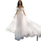 Robe de mariée grande taille amincissante pour les épaules