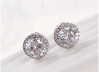 Boucles d'oreilles clous en métal rond argenté avec strass blancs et zircons, idéales pour les fêtes, bijoux pour femmes et filles.