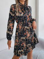 Robe longue plissée élégante à manches longues et taille nouée à imprimé floral pour femme