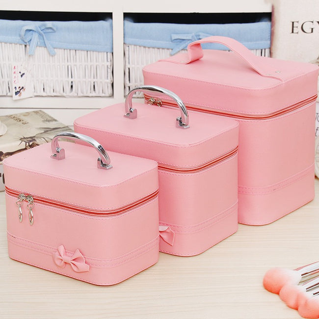 Trousse de toilette Sac pour femme Nœud Grande capacité Boîte de rangement mode Mignon Simple Portable Trousse de maquillage de voyage en PU Hover Image