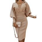 Robe longue tricotée à manches longues et taille haute de couleur unie