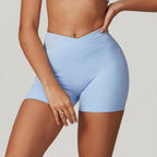 Short d'entraînement taille haute croisé pour femme