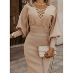 Robe longue tricotée à manches longues et taille haute de couleur unie