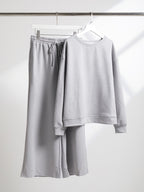 Ensemble deux pièces de sport ample à cordon, de couleur unie, style décontracté européen et américain.