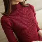 Pull mi-col roulé en fil retors pour femme
