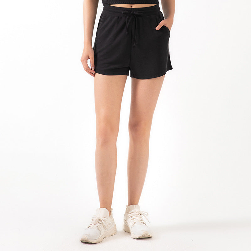 Short ample en dentelle pour femme, short de yoga décontracté, idéal pour la course, le sport et le fitness.