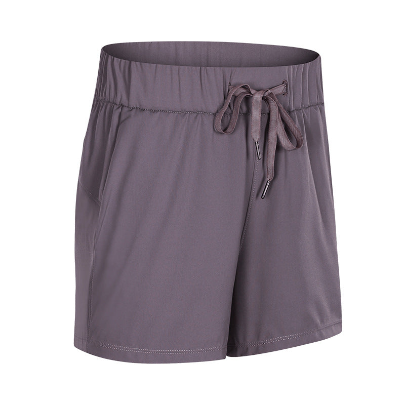 Short de sport ample en dentelle pour femme, extensible et respirant, pour la gym, l'entraînement et le yoga.