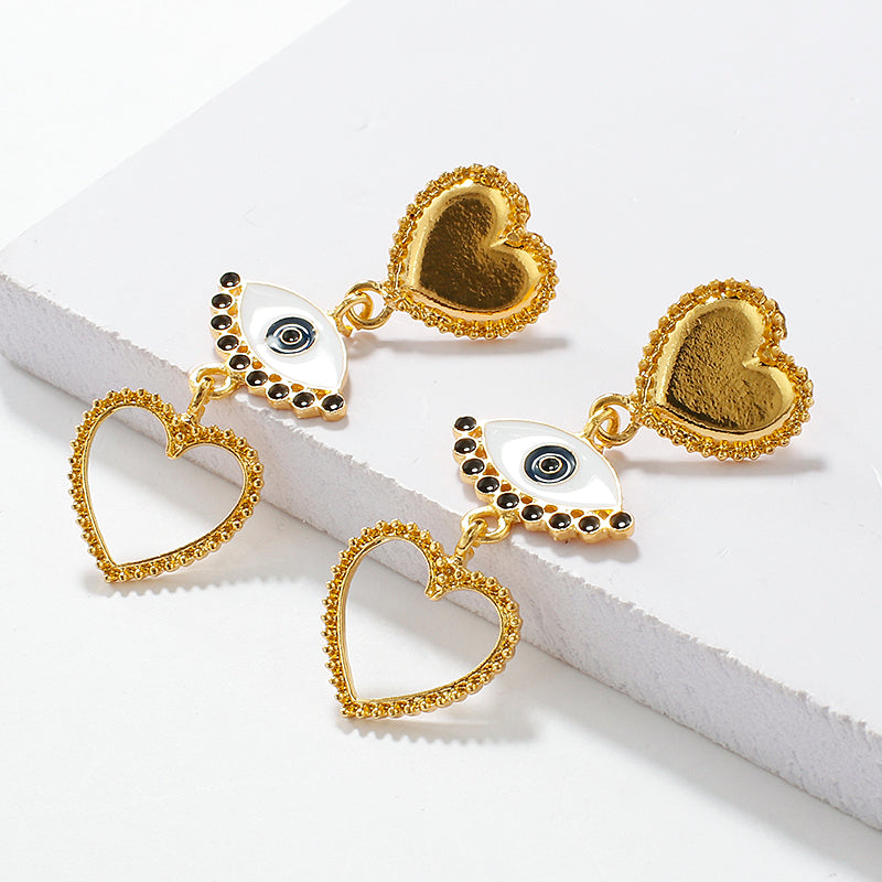 Boucles d'oreilles créatives œil bijoux, style punk, boucles d'oreilles cœur pour femme