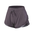 Short de fitness femme faux deux pièces taille haute extensible