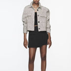 Blazer texturé en tweed pour femme avec poches plaquées