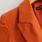 Blazer à manches longues et ceinture