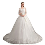 Robe de mariée, traîne, décolleté en V profond, dentelle