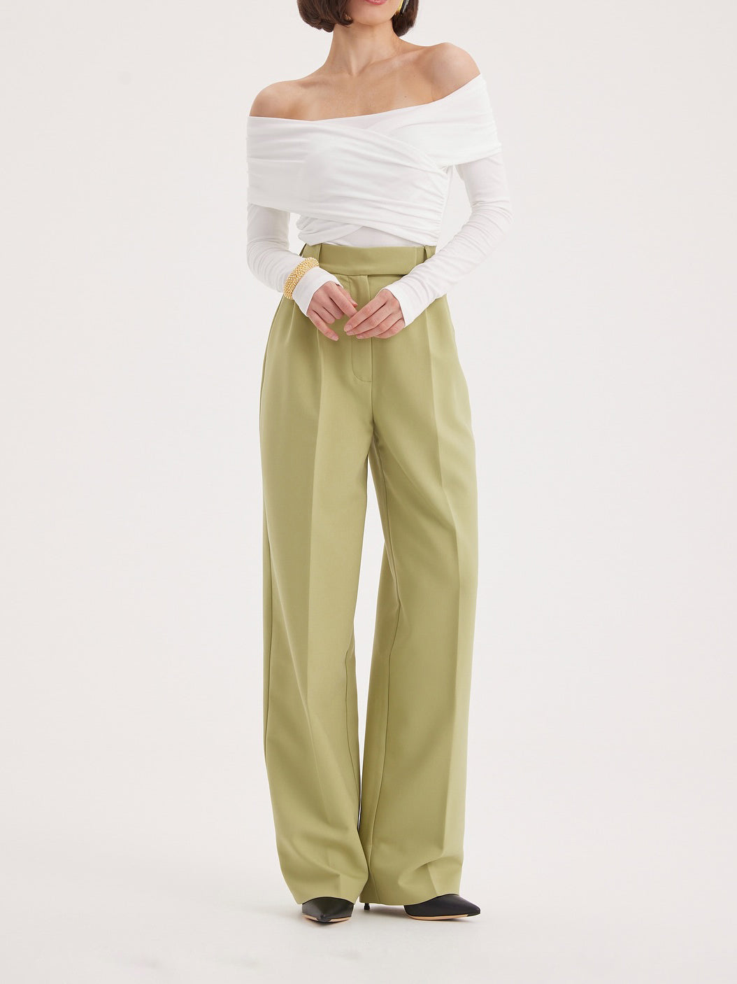 Ensemble veste de costume verte cintrée et pantalon taille haute