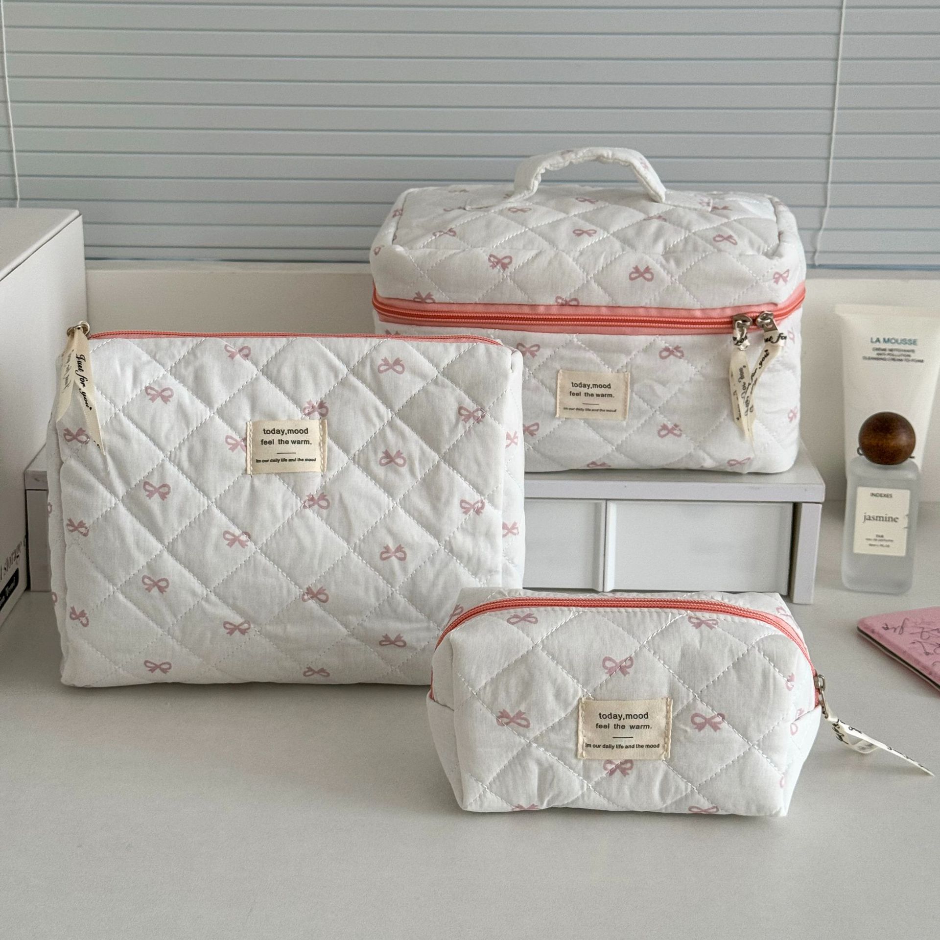 Trousse de maquillage grande capacité à nœud papillon