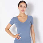 Haut de sport de yoga à manches courtes de couleur unie, extensible et sans coutures pour femme