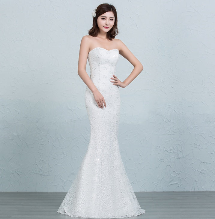 Robe de mariée sirène en dentelle sequinée à la taille