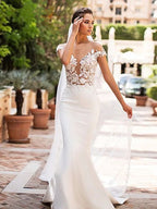 Robe de mariée sirène creuse à col profond pour femme
