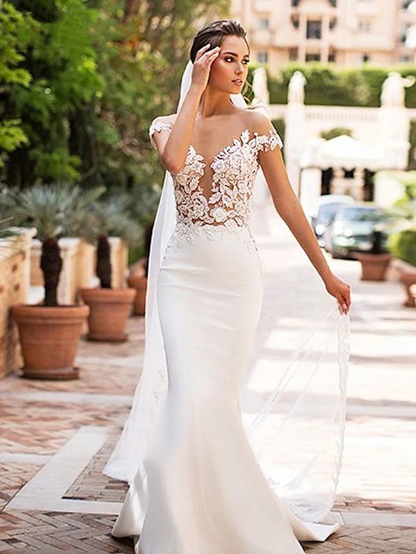 Robe de mariée sirène creuse à col profond pour femme