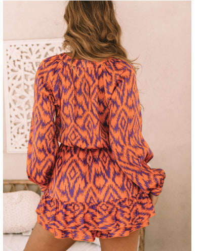 Robe à col montant imprimée à manches longues et taille élastique avec poches, pour l'export.