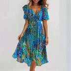 Robe d'été évasée à fleurs imprimées et col en V, à manches courtes pour femme