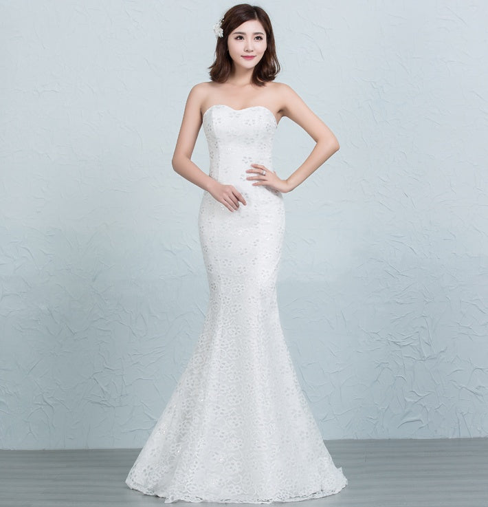 Robe de mariée sirène en dentelle sequinée à la taille