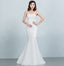 Robe de mariée sirène en dentelle sequinée à la taille