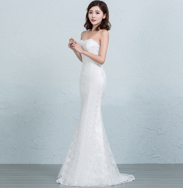 Robe de mariée sirène en dentelle sequinée à la taille