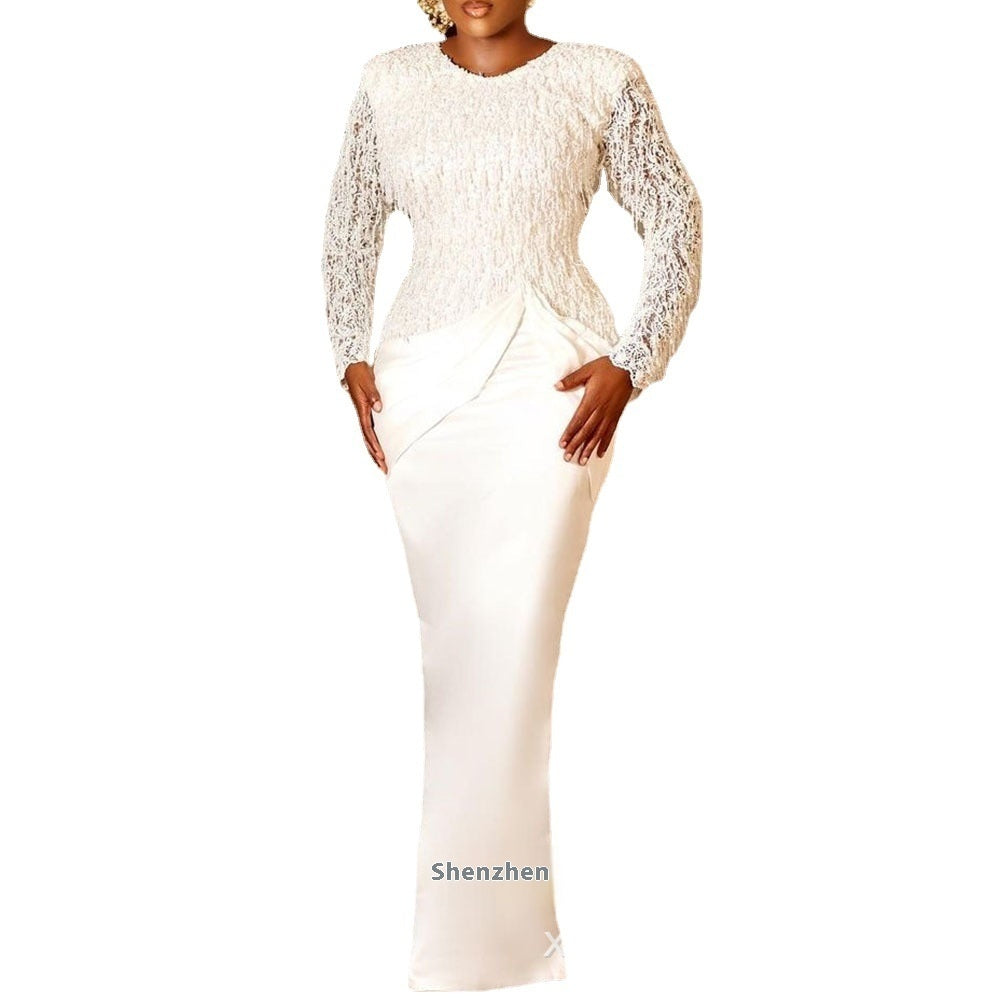 Robe longue à manches longues avec pompon en dentelle élégant et taille cintrée