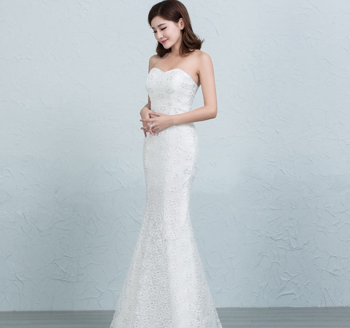 Robe de mariée sirène en dentelle sequinée à la taille