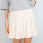 Pleated skirt with bow tie