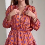 Robe à col montant imprimée à manches longues et taille élastique avec poches, pour l'export.