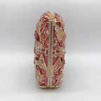 Pochette de soirée en métal rose, chaîne et diamants