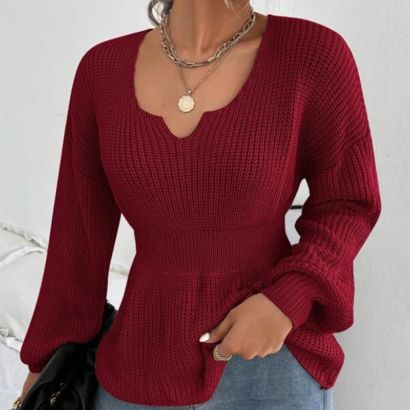 Pull femme à volants et taille ajustée