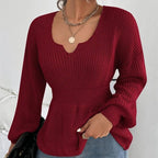 Pull femme à volants et taille ajustée