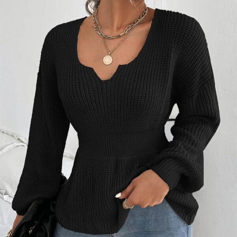 Pull femme à volants et taille ajustée