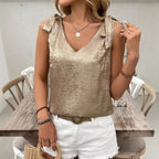 Camisole sans manches en dentelle avec nœud papillon et décolleté en V pour femme, avec détails dorés en relief
