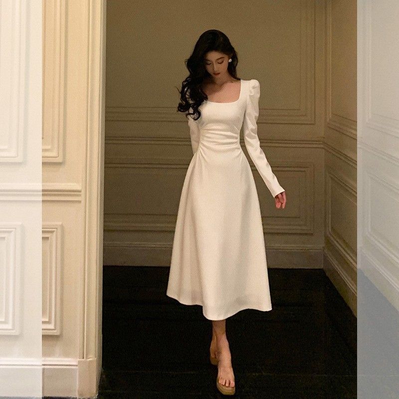 Robe noire sophistiquée à la française pour femme
