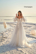 Robe de mariée de plage à manches bouffantes pour femme