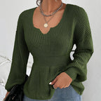 Pull femme à volants et taille ajustée