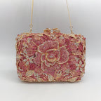 Pochette de soirée en métal rose, chaîne et diamants