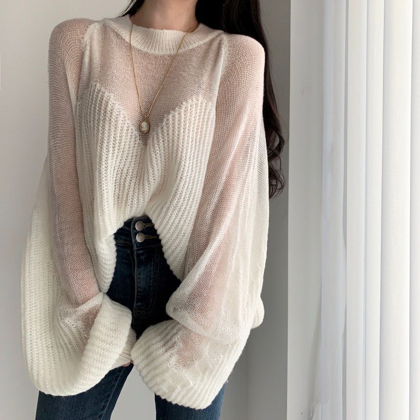 Pull en tricot à manches lanternes et sens artistique pour femme