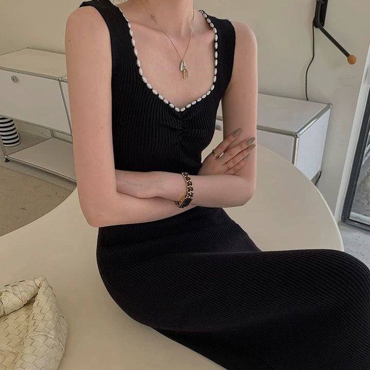 Robe pull noire de niche pour femme