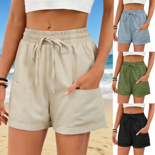 Short ample uni avec poches, taille élastique et cordon de serrage pour femme