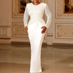 Robe longue à manches longues avec pompon en dentelle élégant et taille cintrée