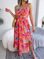 Robe longue de plage sans manches à imprimé floral et découpes pour femme